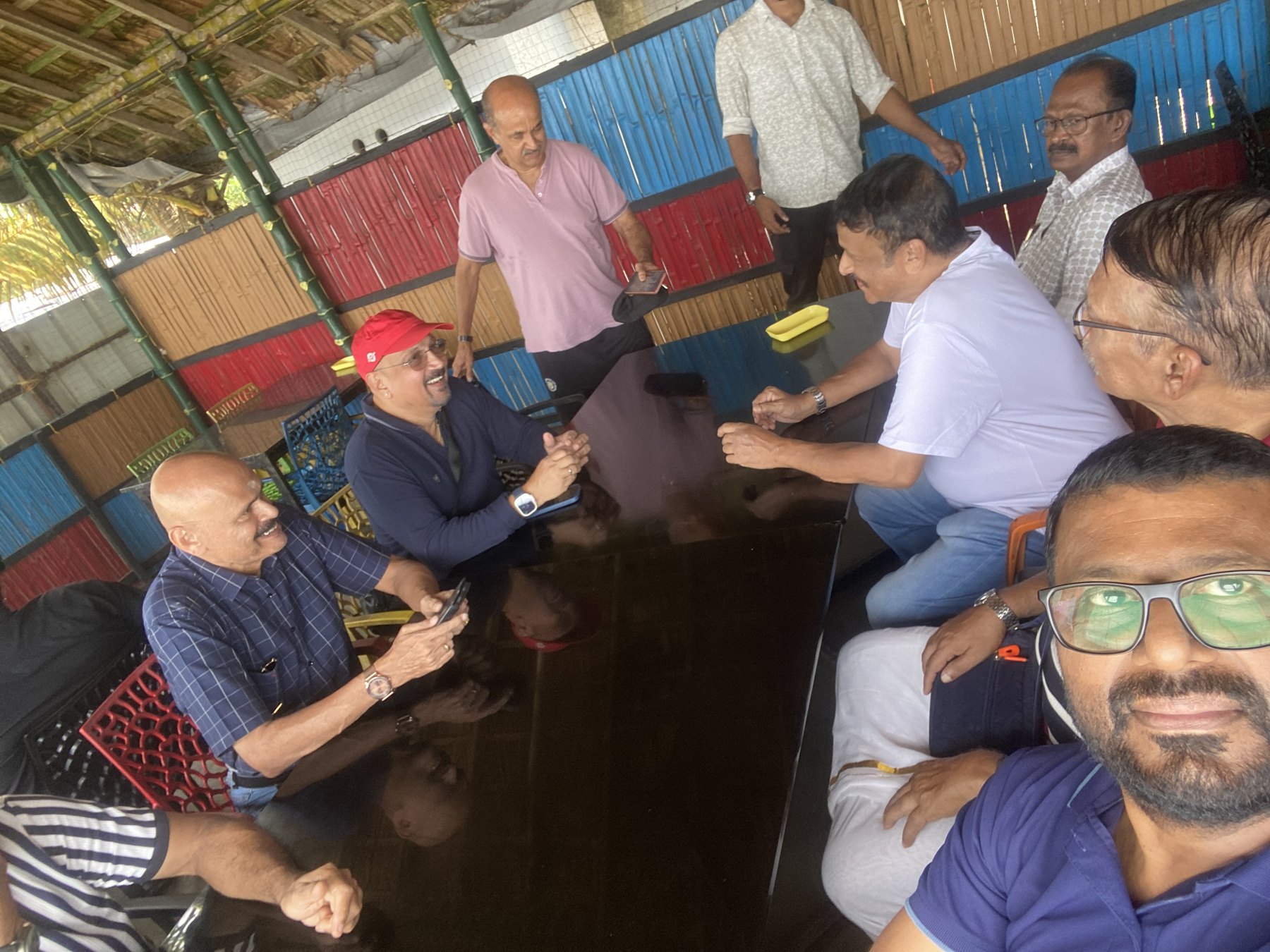 A relaxed group moment during the WCC Veterans Cherai Beach Tour.
